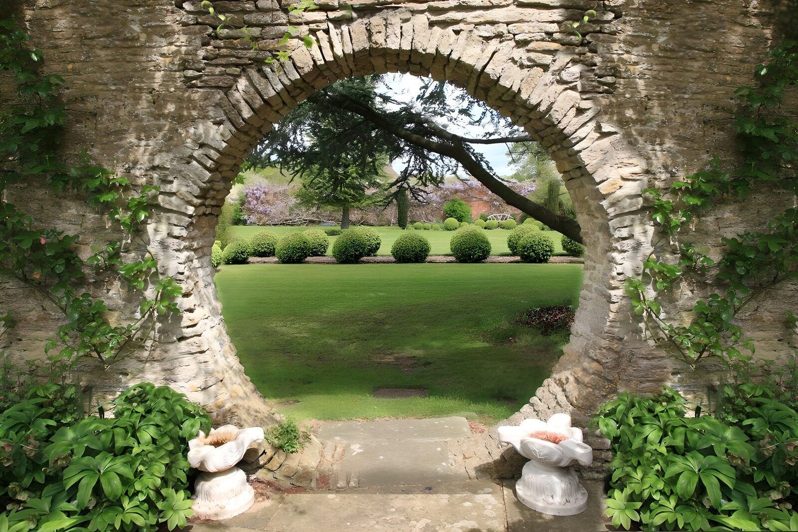 OCUK30817: Round pathway overgrown with ivy and a view at the garden