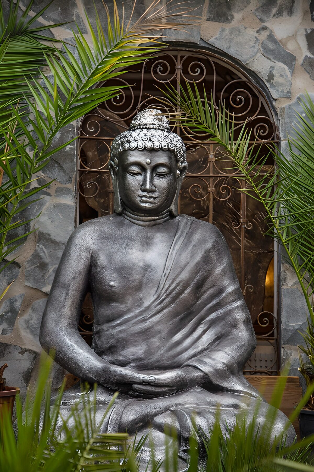 OCUK74442: Peaceful Buddha Statue Surrounded by Nature