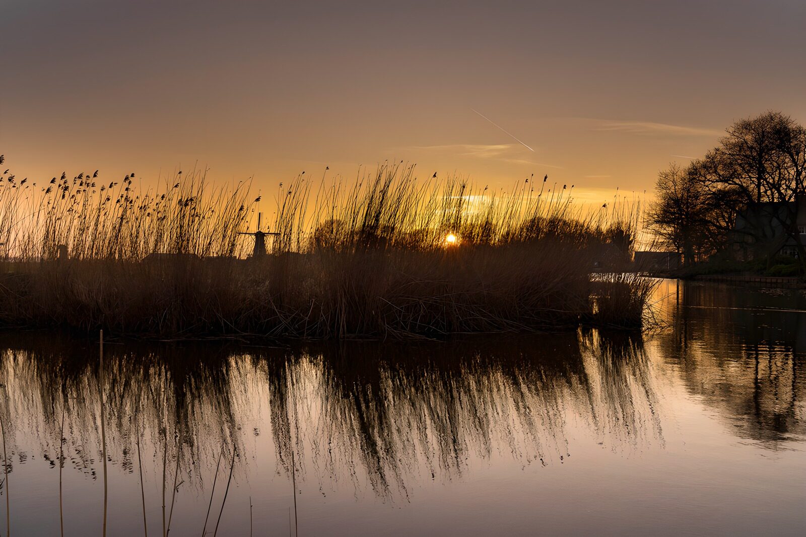 OCUK75236: Sunset Reflections Over Calm Waters