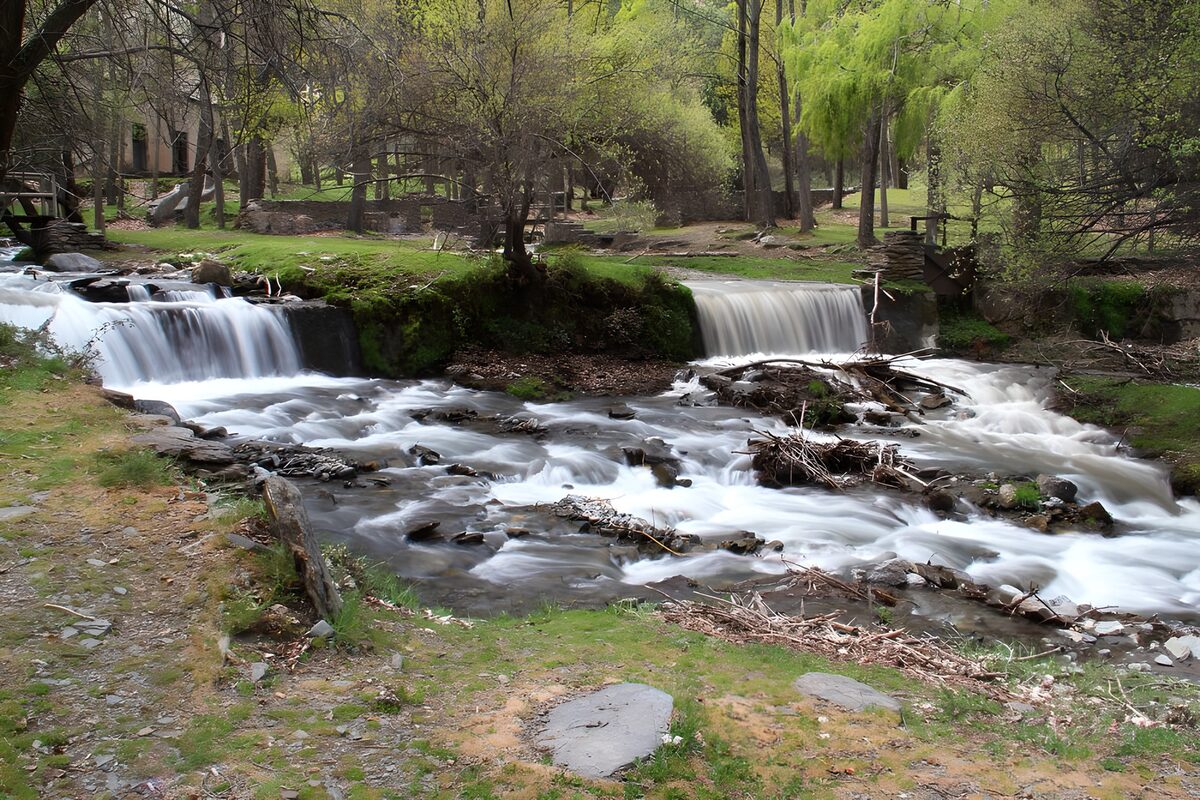 OCUK12187: Serene Stream Flowing Through Nature