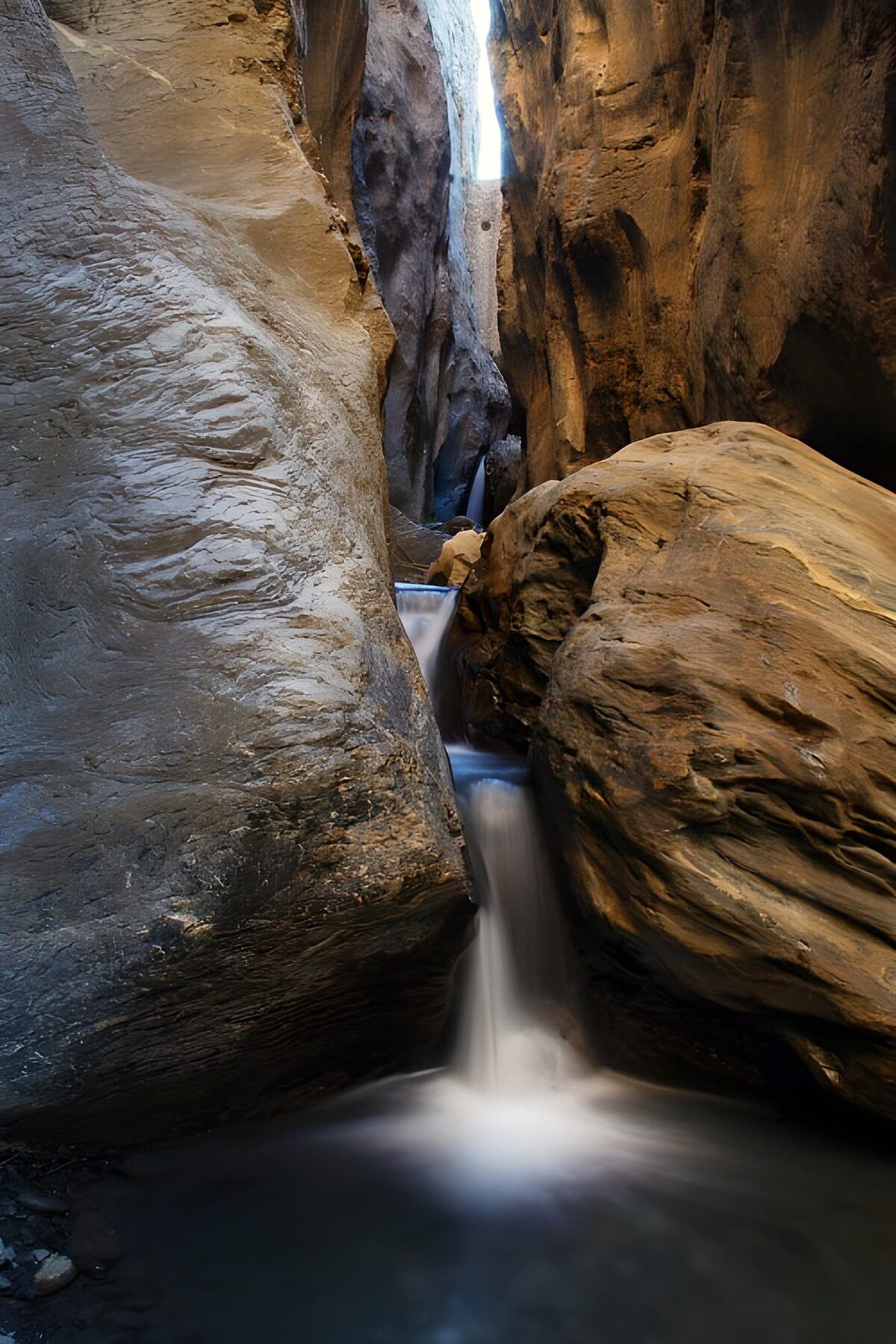 Serene Waterfall in a Rocky Canyon
