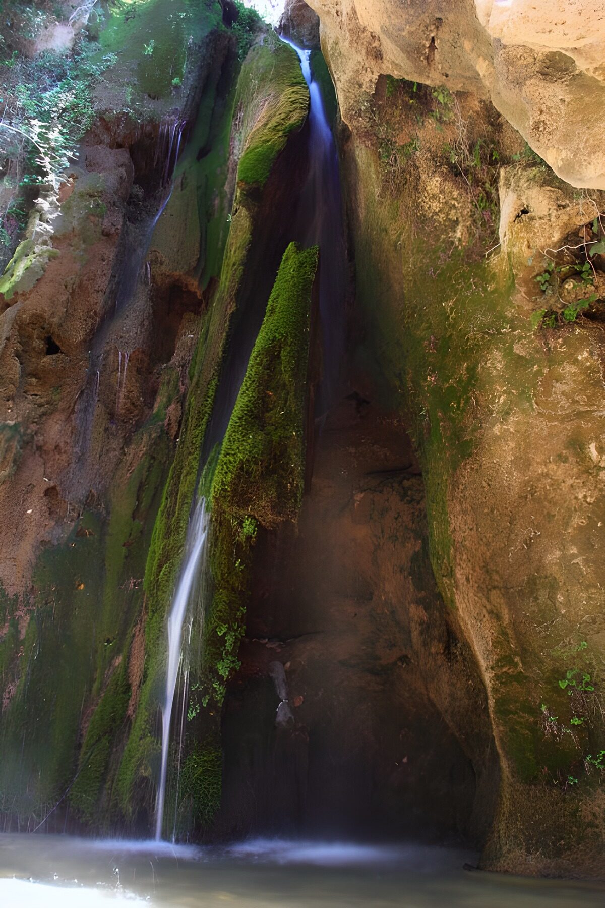 Tranquil Cascade in a Mossy Canyon