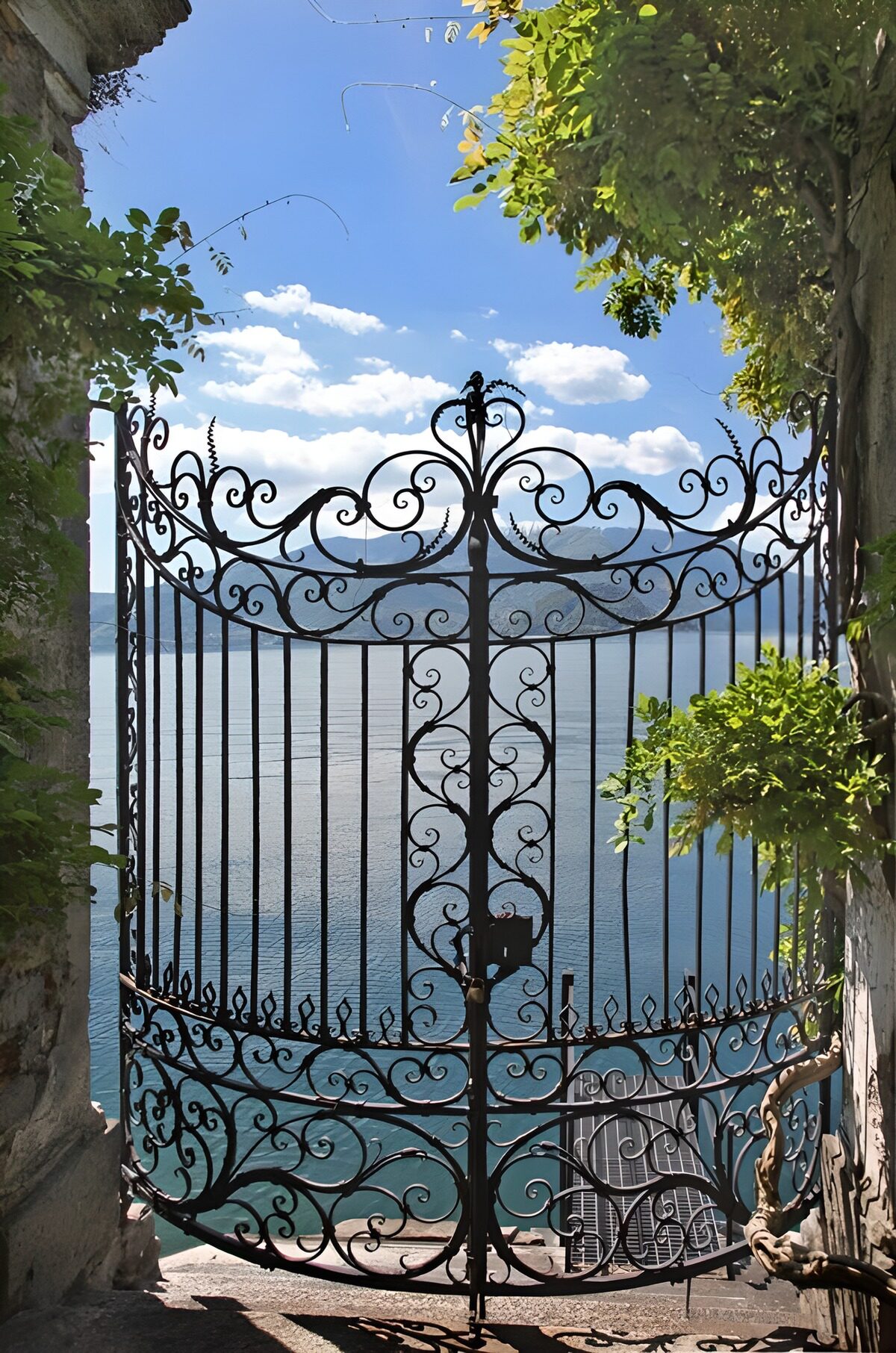 OCUK36316: Old iron fence on balcony with lookout at sea