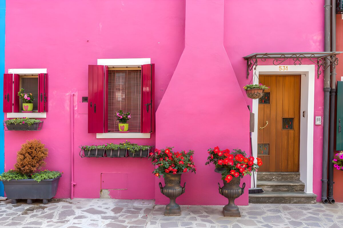Vibrant Pink House with Flowers