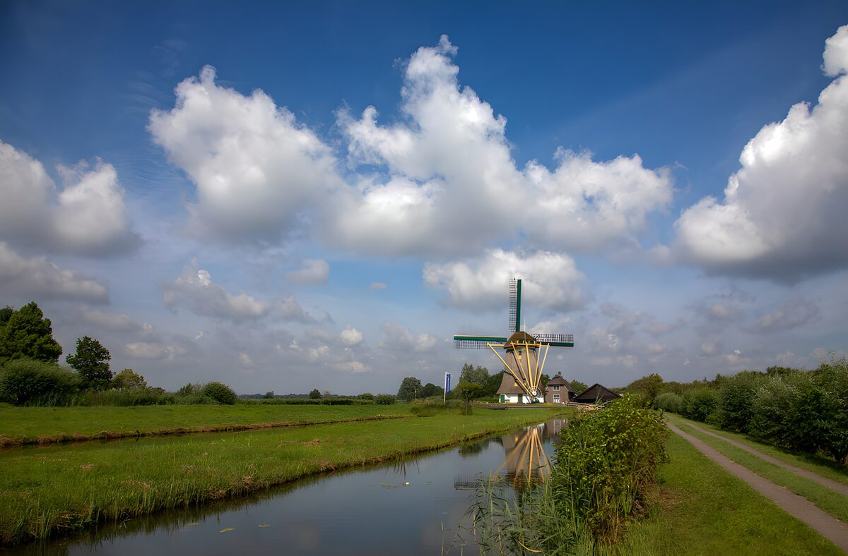 OCUK72159: Scenic Dutch Windmill by the Water