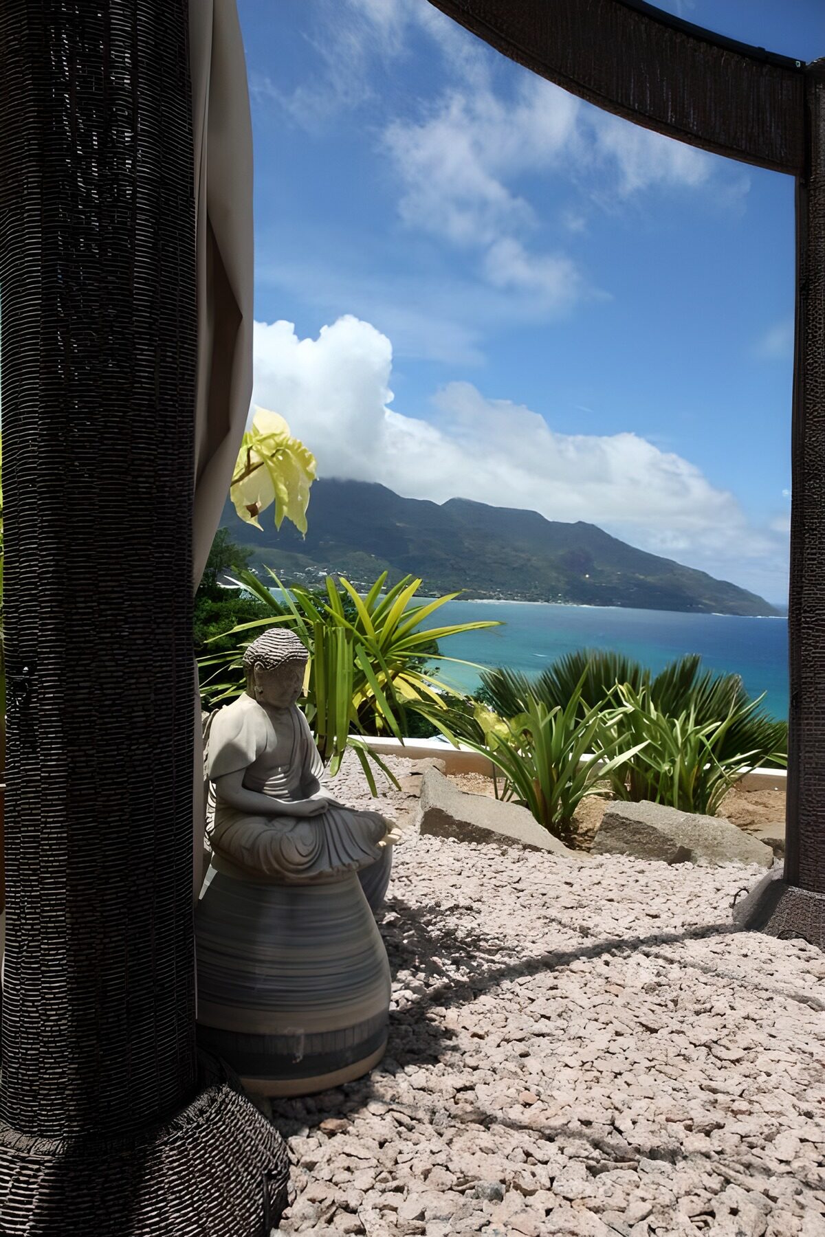 OCUK22077: Tranquil Ocean View with Buddha Statue