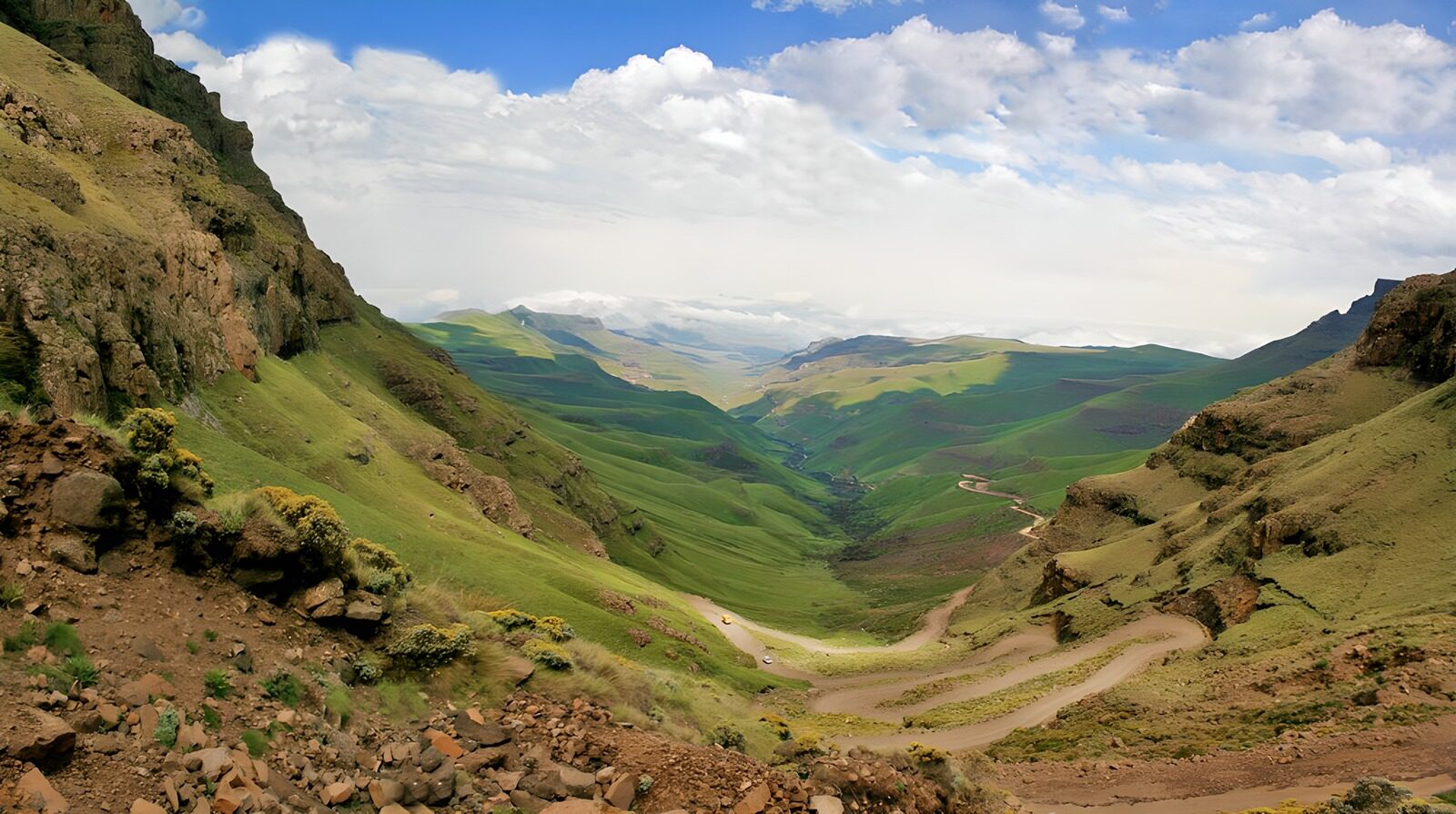 OCUK21291: Lush Green Valley Under a Blue Sky