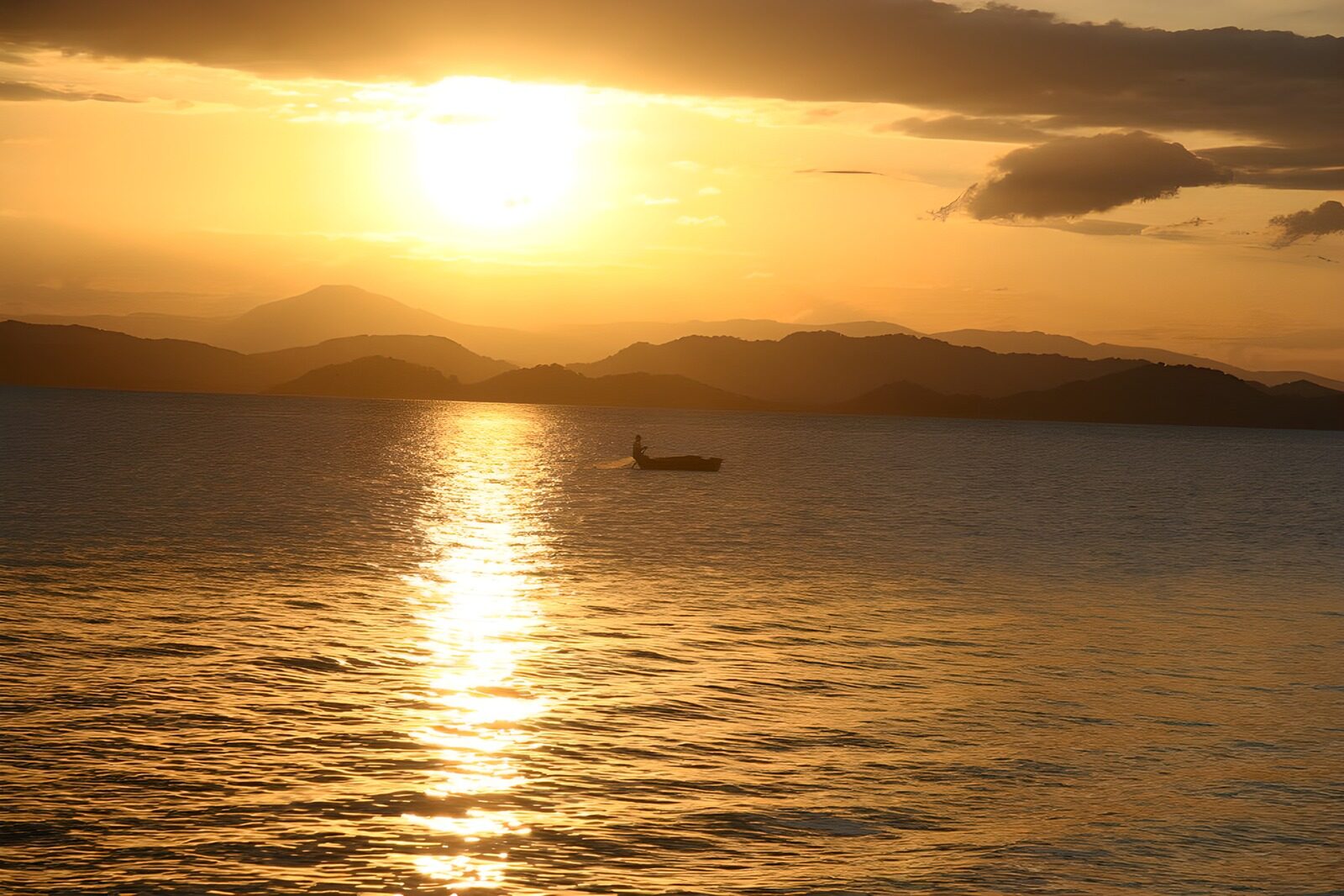 OCUK42796: Serene Sunset Over Calm Waters
