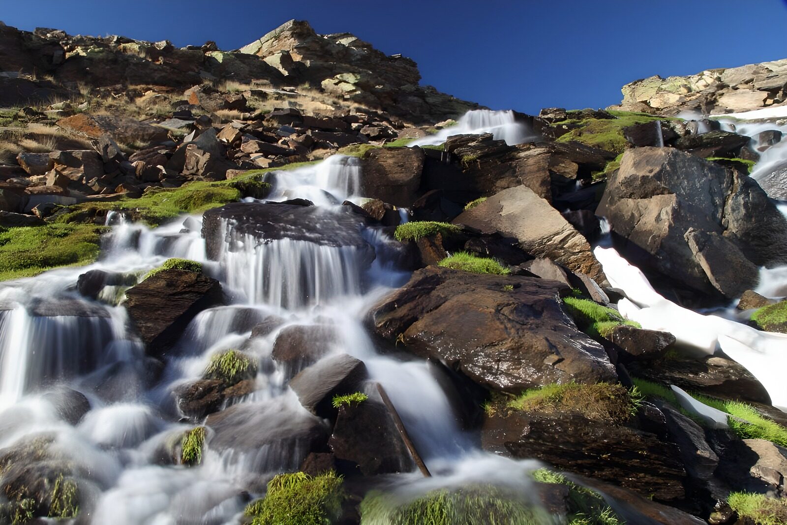 OCUK95700: Tranquil Mountain Waterfall