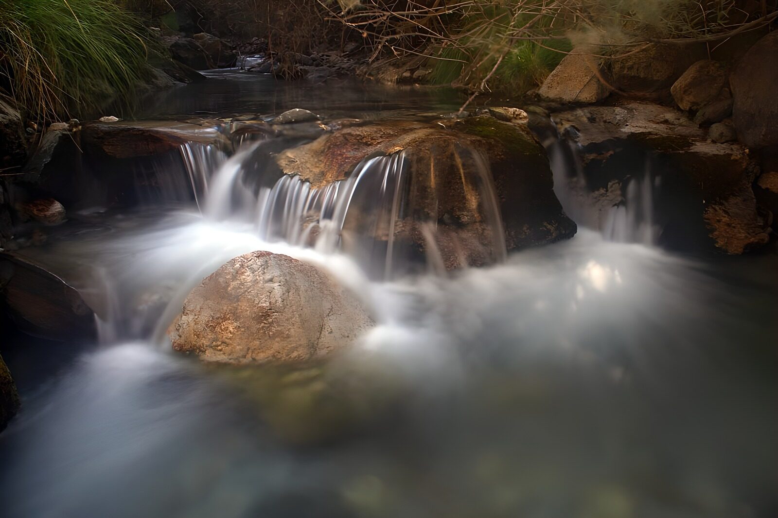 OCUK81487: Tranquil Stream with Gentle Waterfall