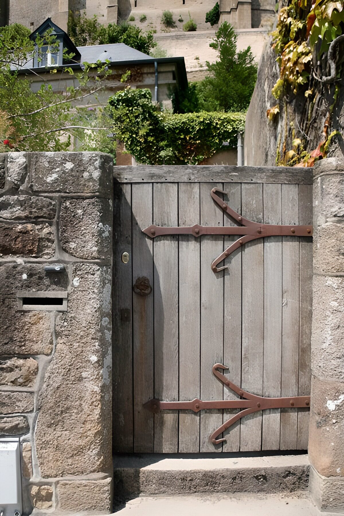 OCUK68533: Old garden gate in stone wall in France
