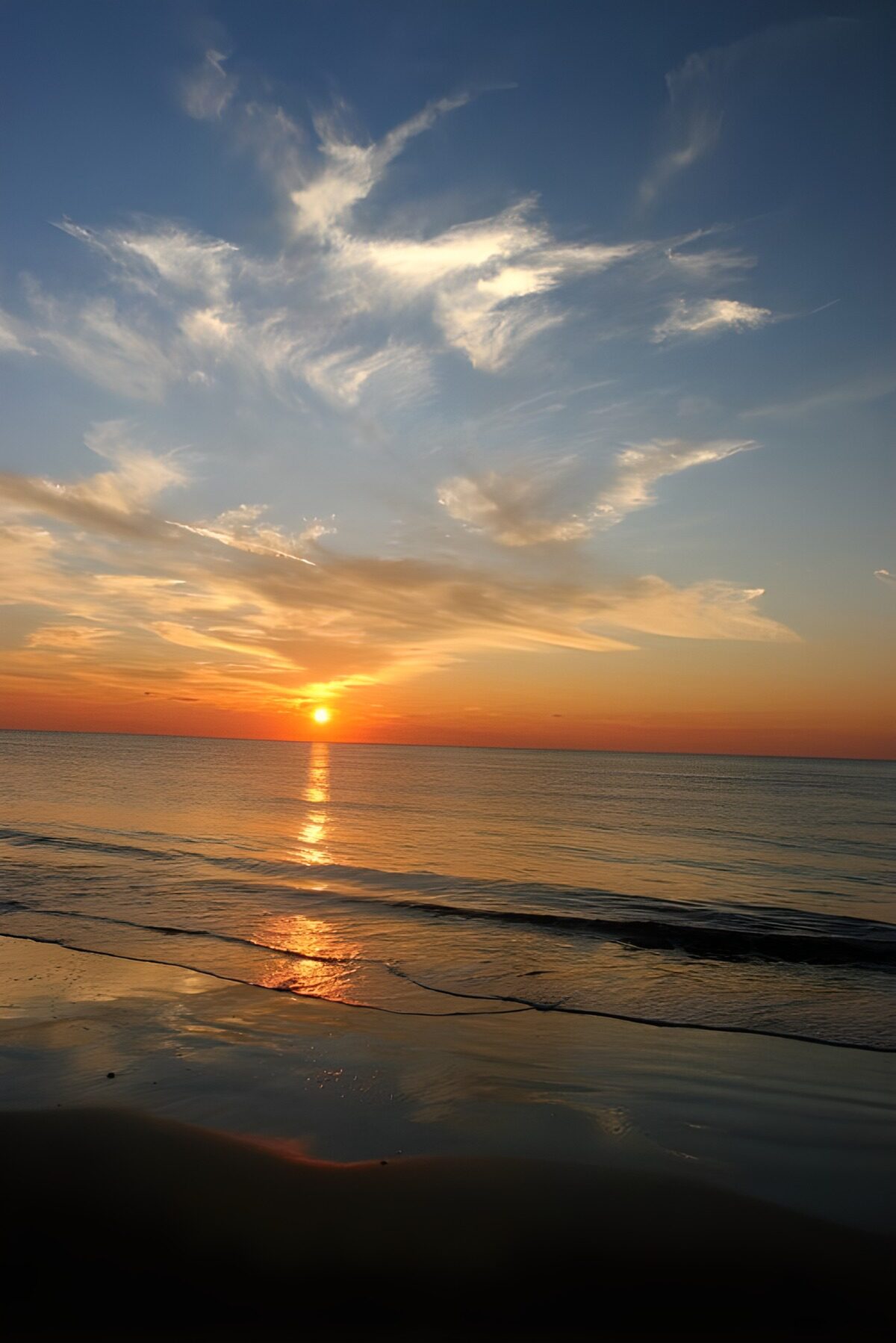 OCUK40698: Tranquil Sunset Over Calm Waters