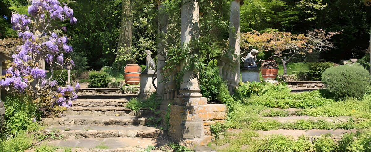 OCUK57538: Two stairways covered with flowers, plants and flowerpots