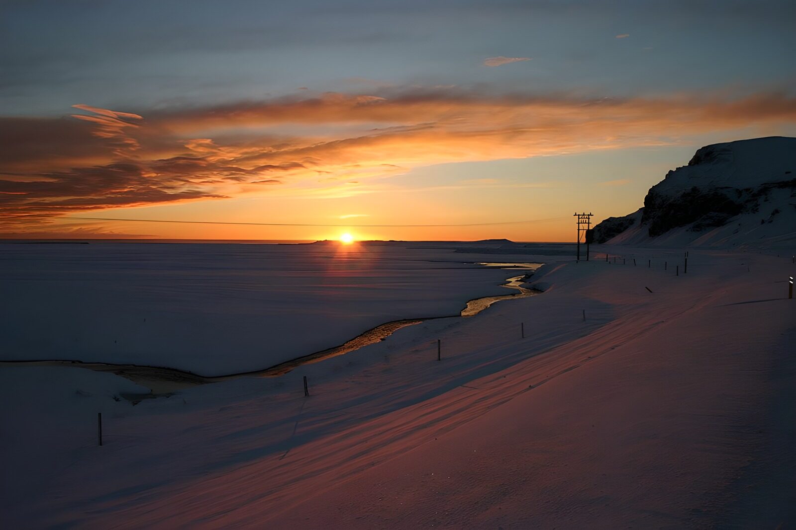 OCUK81343: Sunset Over a Snowy Landscape
