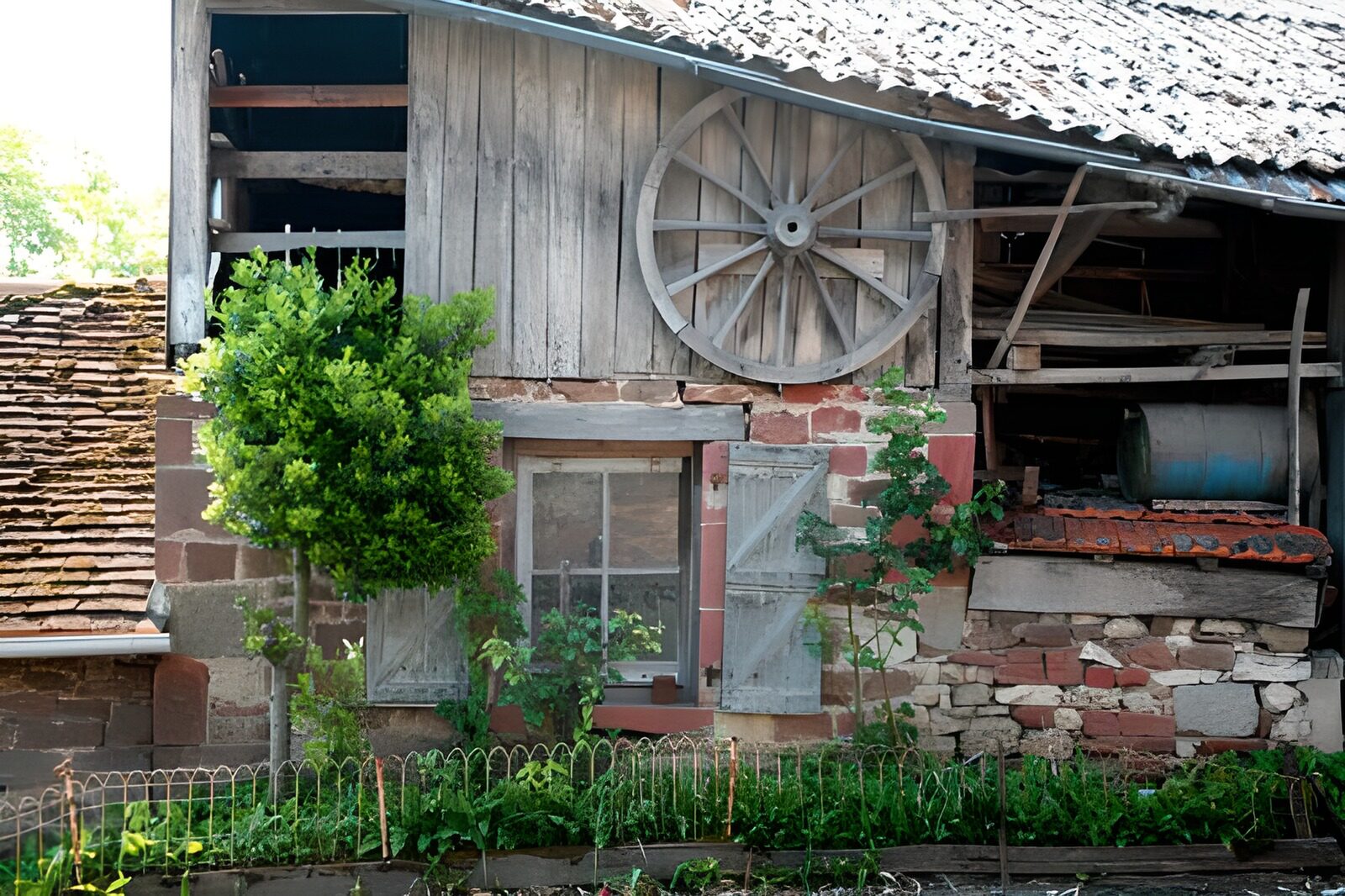 OCUK41420: Old French farm with old wheel and shutters etc version 2