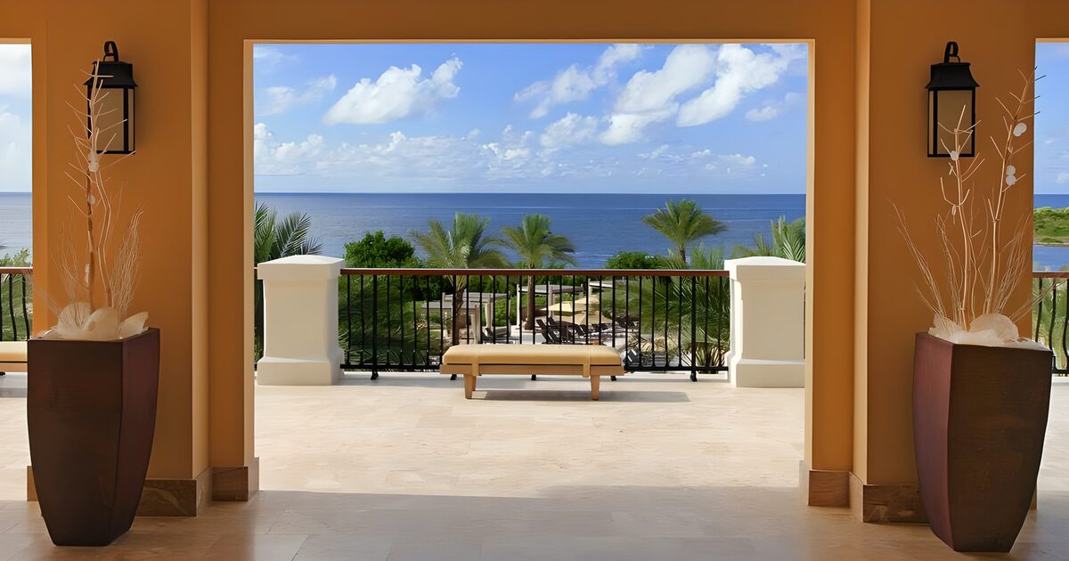 View from the resort towards the palm trees  and over the Caribbean