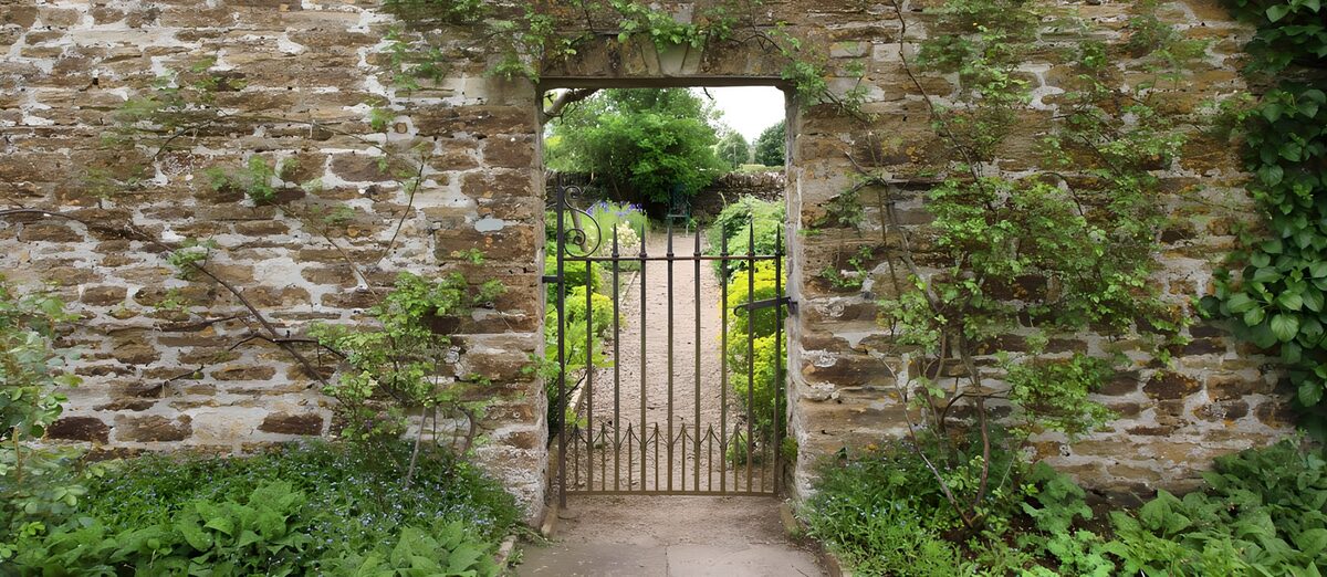 OCUK15212: Quaint Garden Gate Framed by Stone Wall