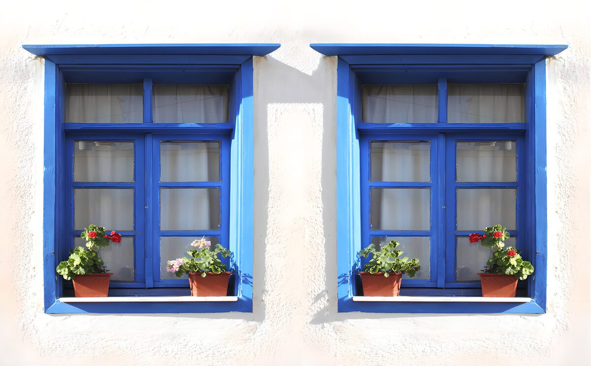 OCUK93753: Charming Blue Windows with Flower Pots