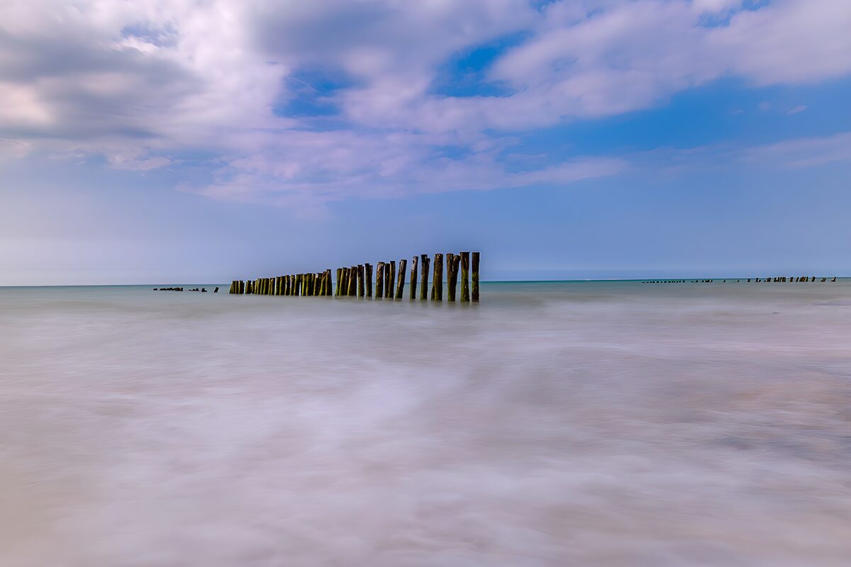 OCUK59303: Serene Waters with Wooden Posts