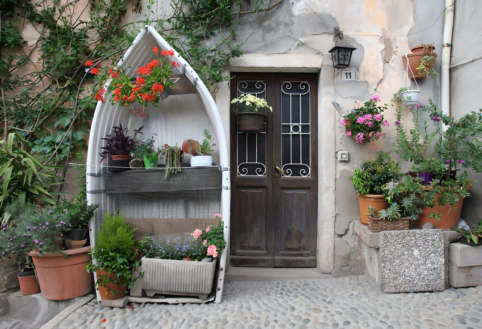 OCUK18672: Charming Floral Entrance with Boat Planter
