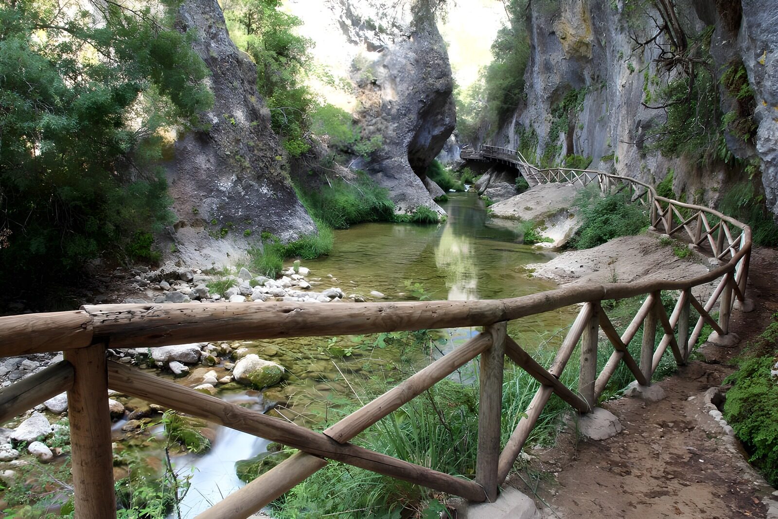 OCUK83467: Serene River Pathway in a Gorge