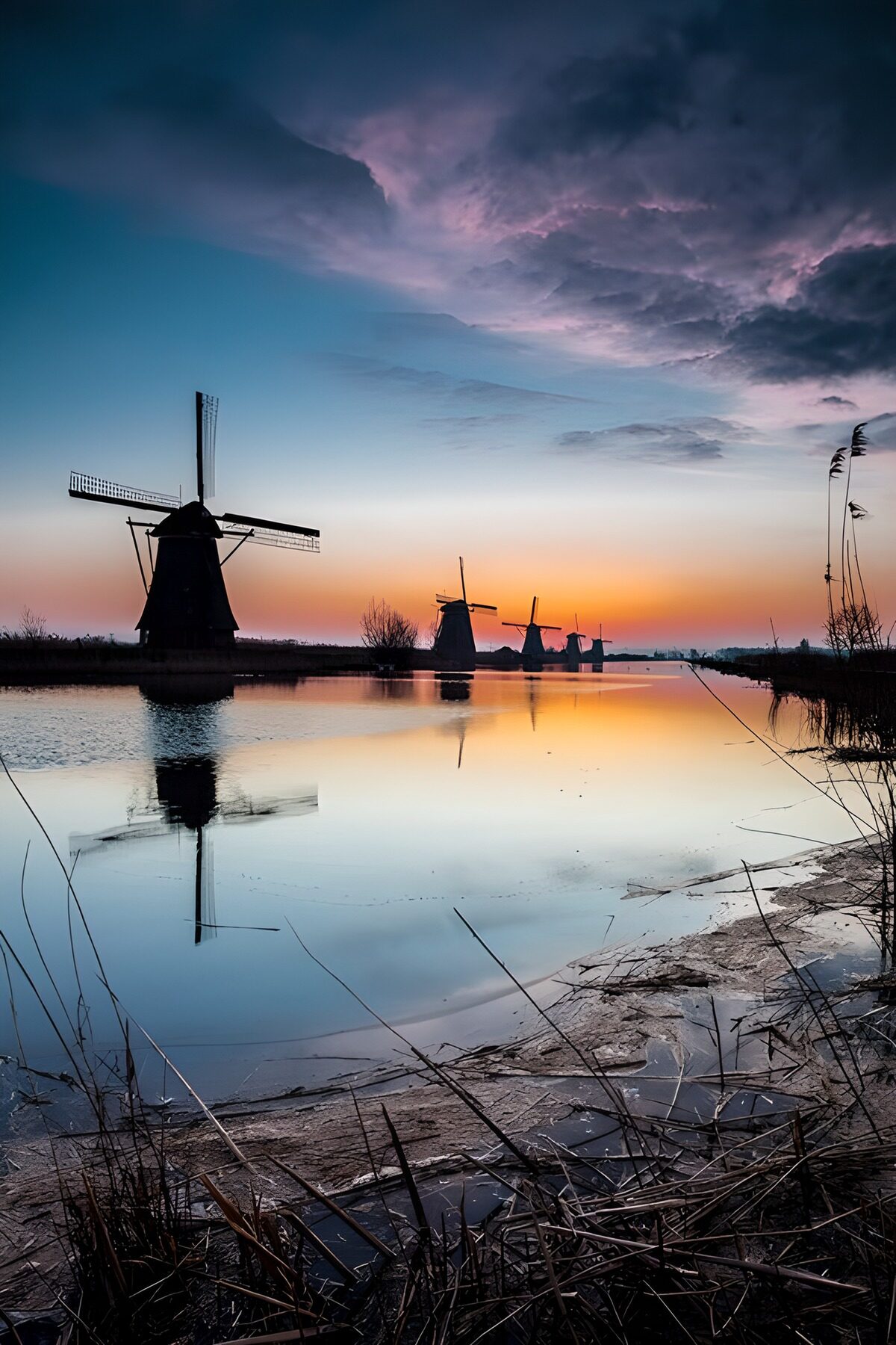 OCUK71399: Serene Sunset Over Dutch Windmills