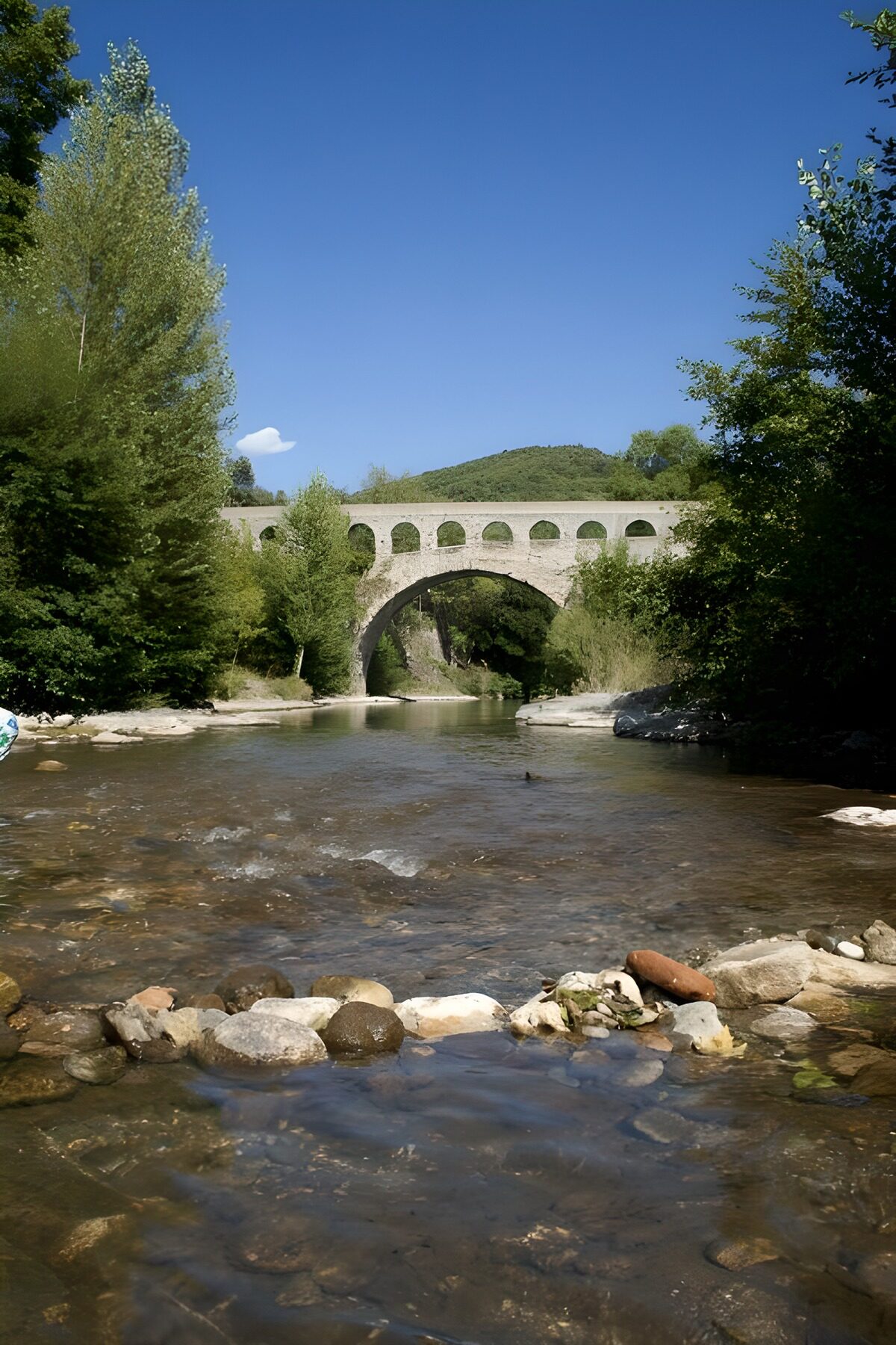 OCUK81537: Serene Stone Bridge Over Tranquil River