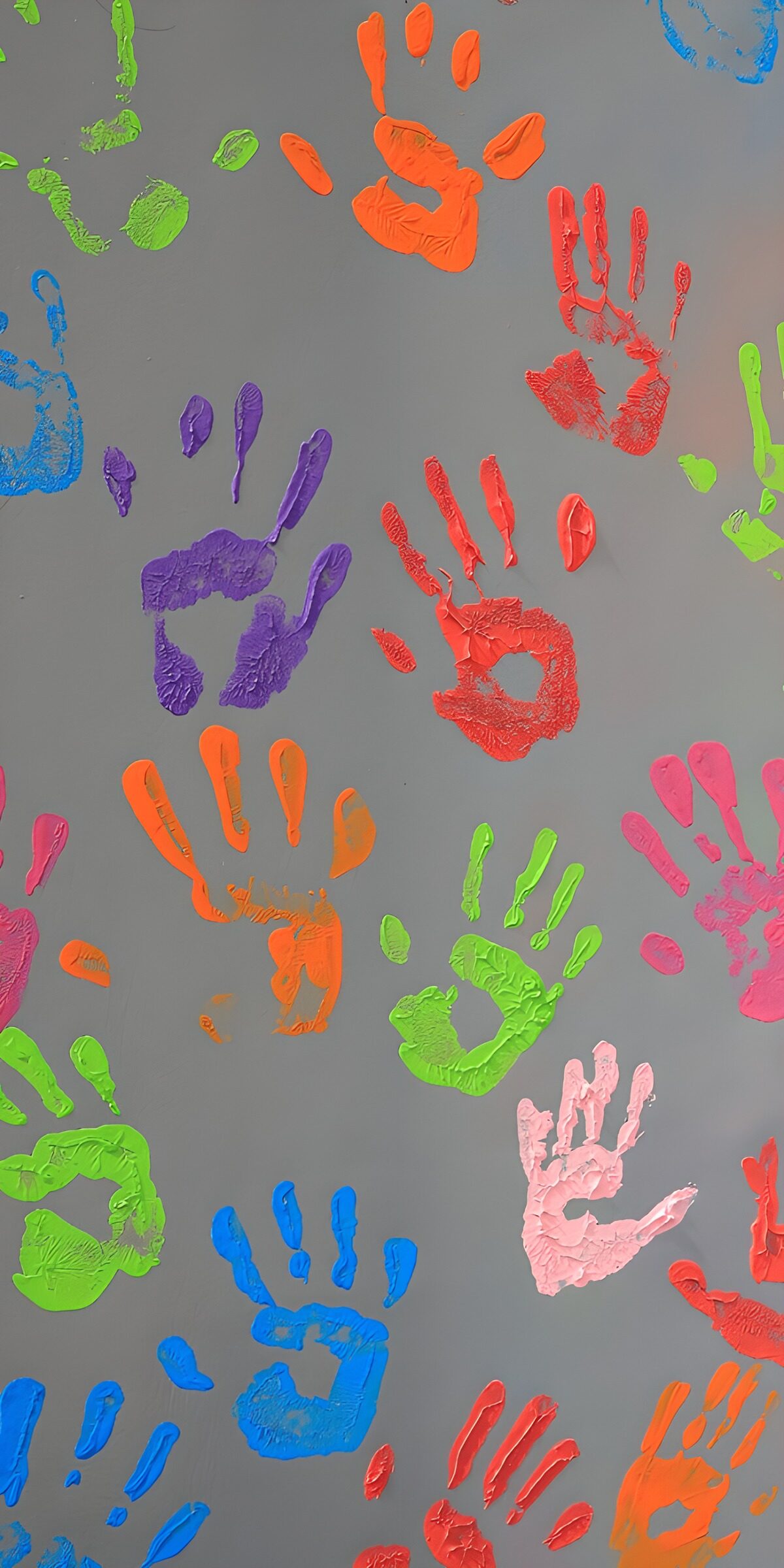 OCUK75654: Vibrant Handprints on Gray Wall