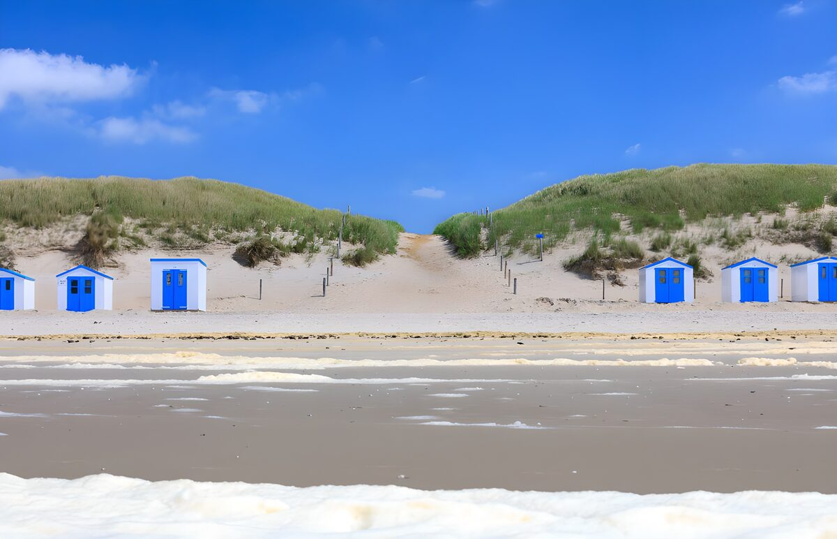 OCUK97170: Beach Huts Under a Sunny Sky