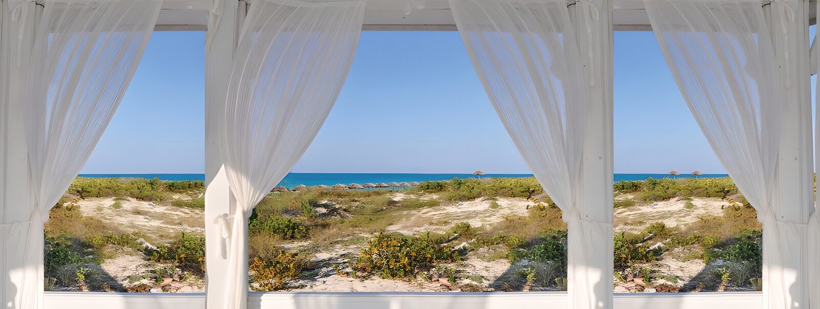 OCUK29925: Tropical view on beach and blue ocean with white waving curtains in front