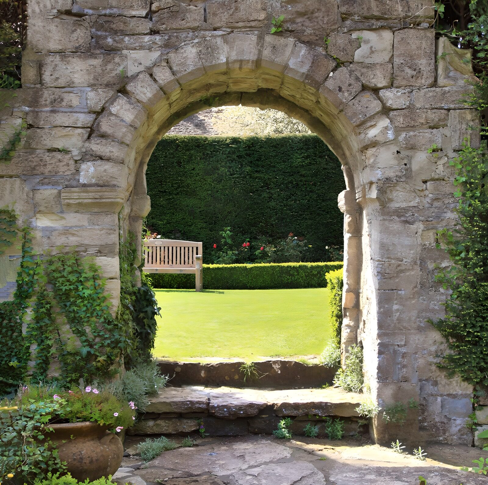 OCUK25414: Looking at a garden through a brick arch