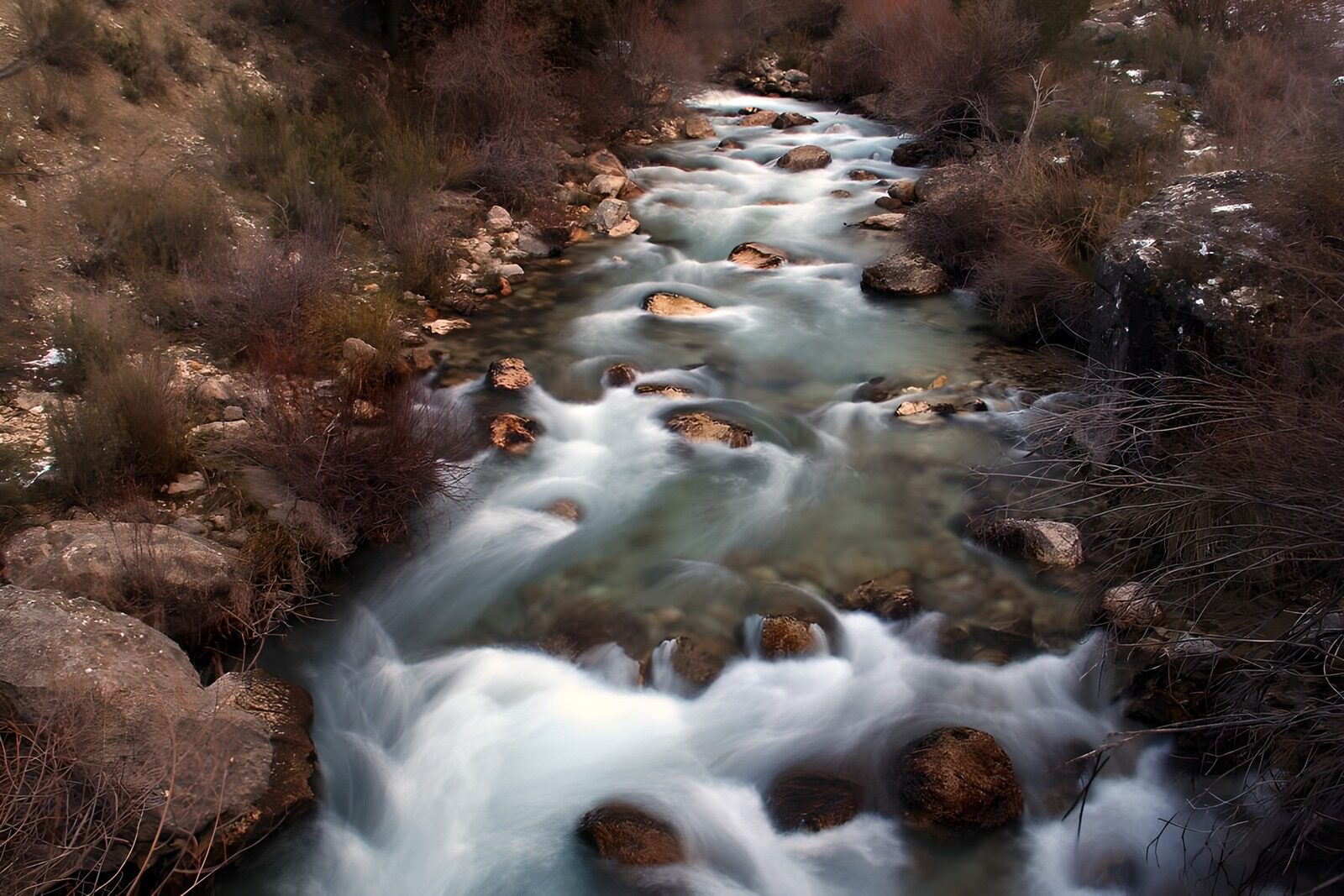 OCUK56460: Flowing Stream Over Pebbled Bed