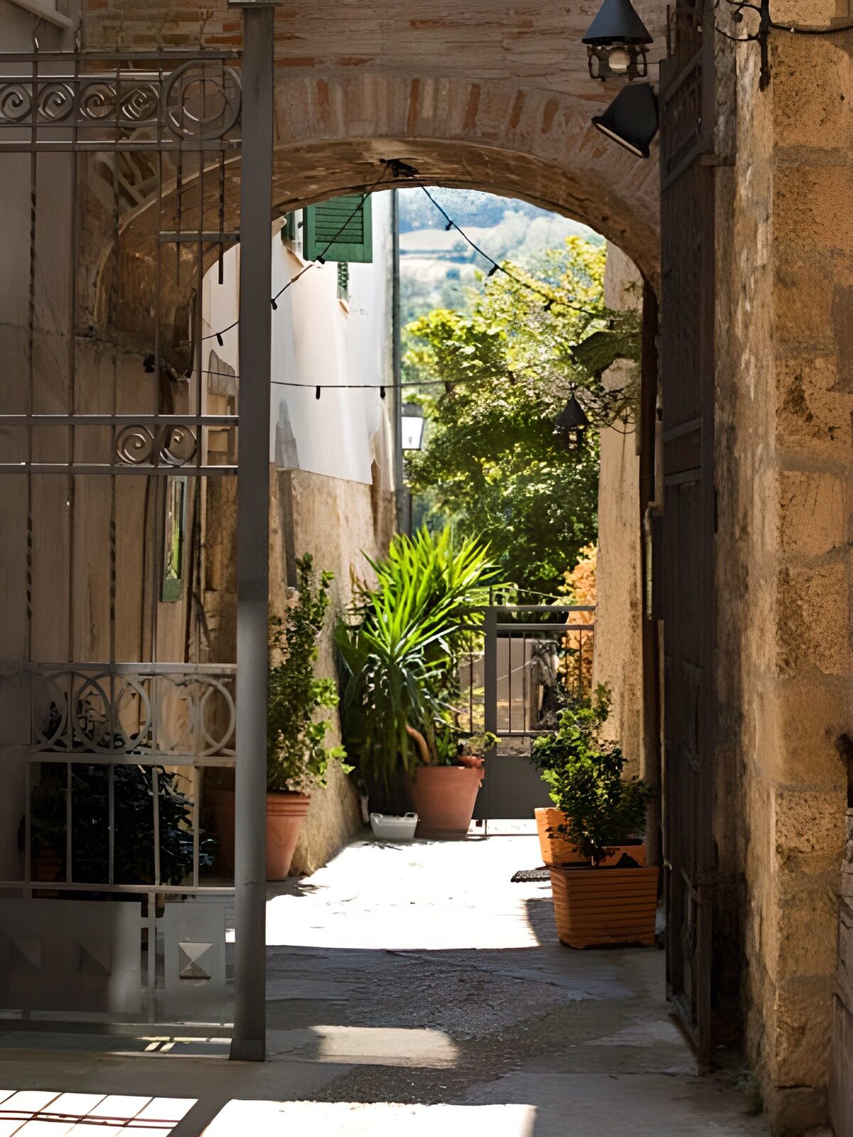 Open gate with view onto patio house