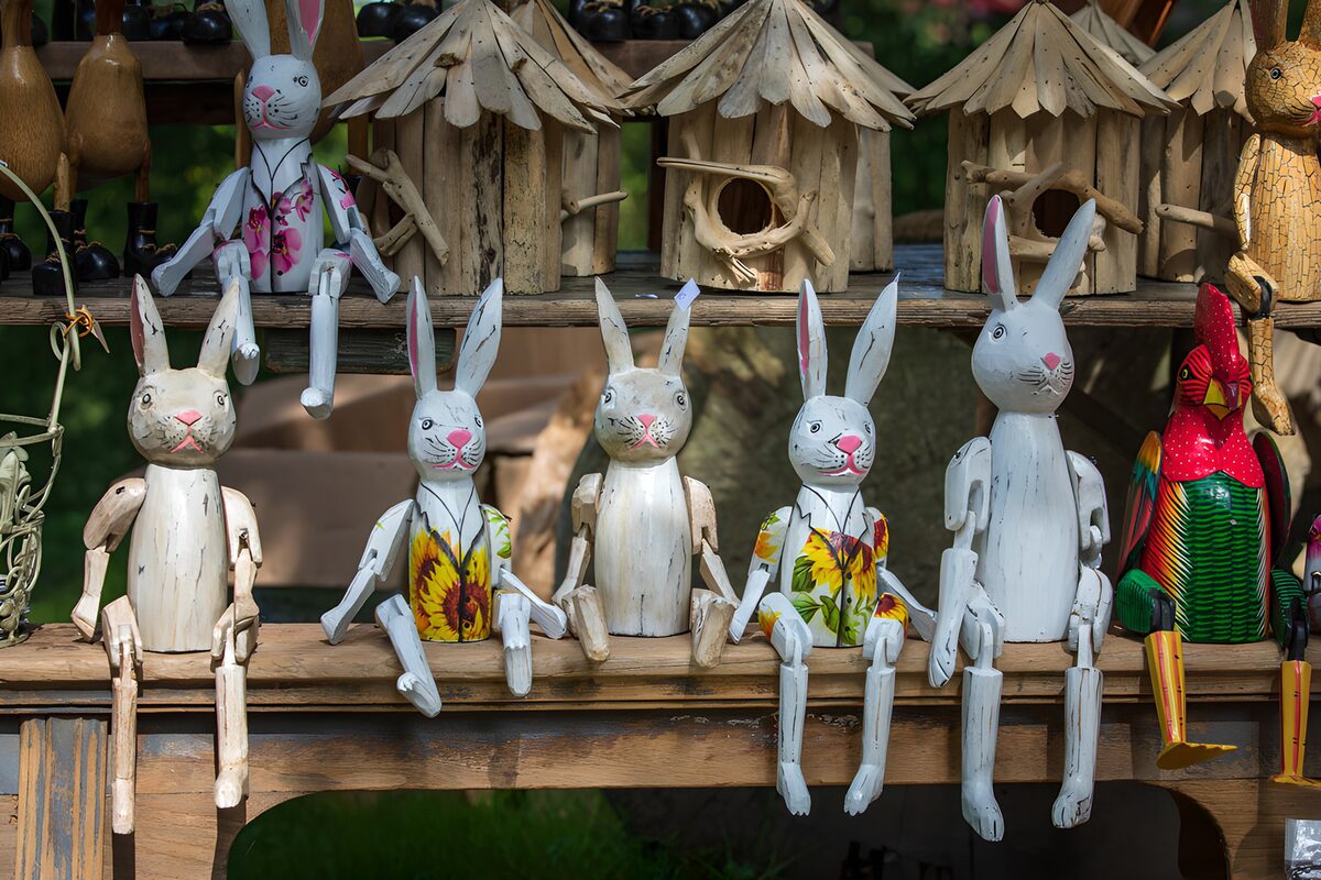 OCUK59589: Whimsical Wooden Rabbit Figurines