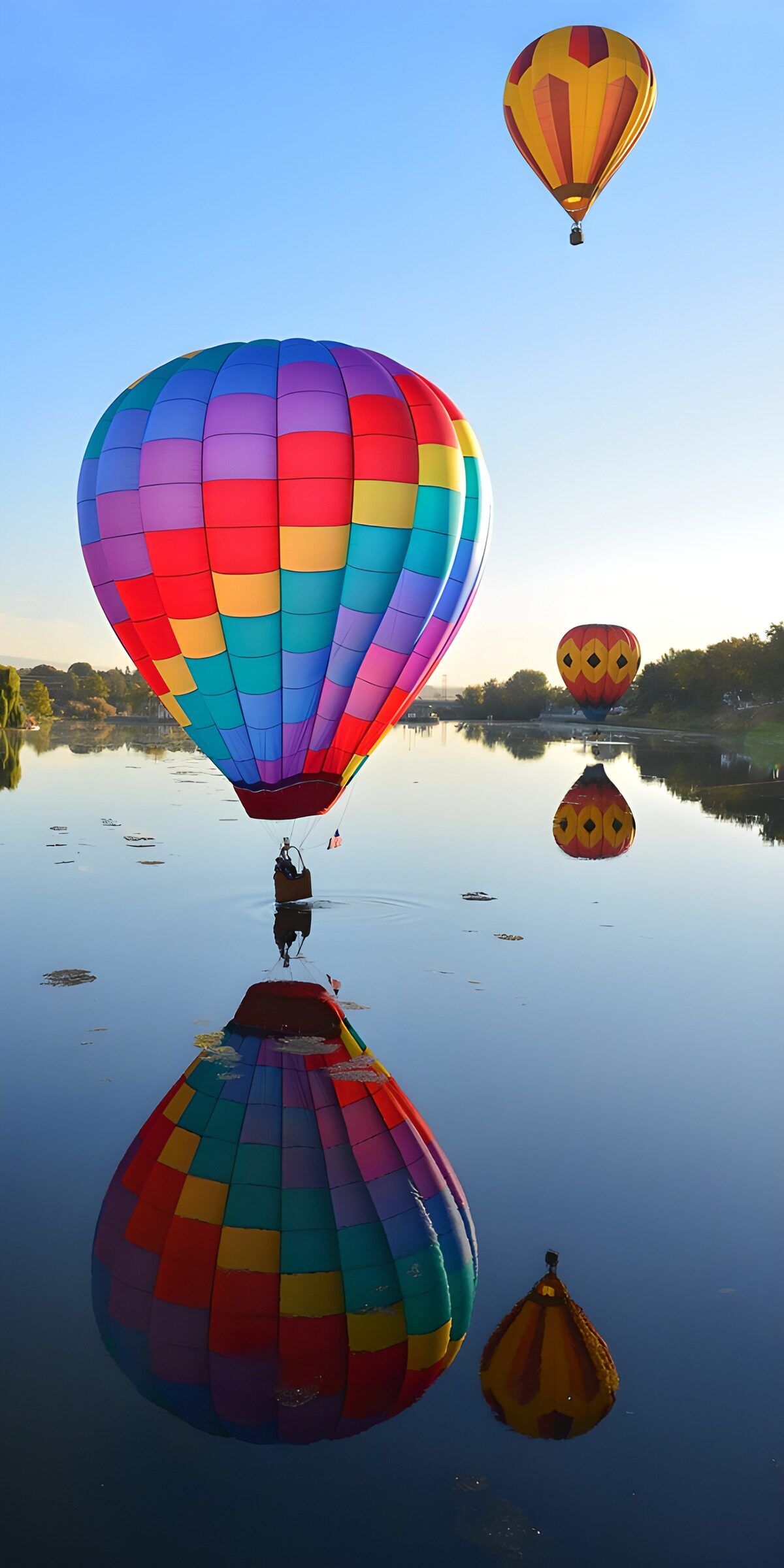 OCUK45466: Colorful Hot Air Balloons Over Water