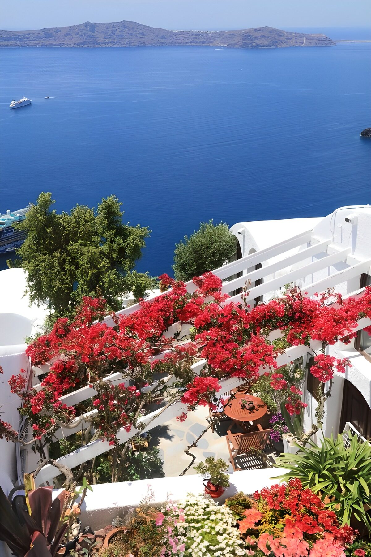 OCUK44733: Idyllic Santorini View with Bougainvillea
