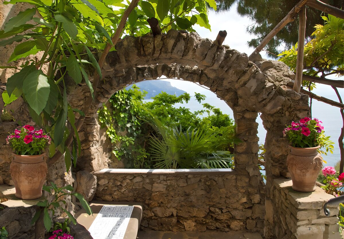 OCUK83023: Brick wall on terrace with lookout at the sea
