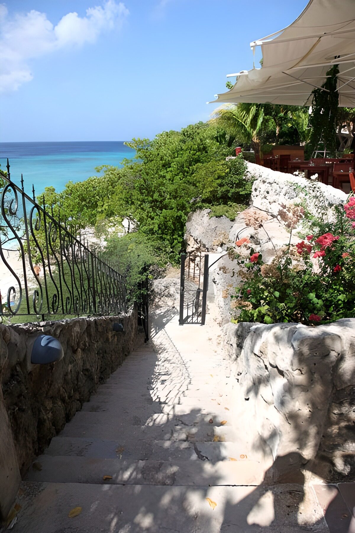 OCUK43556: Steps up to the sea with open gate