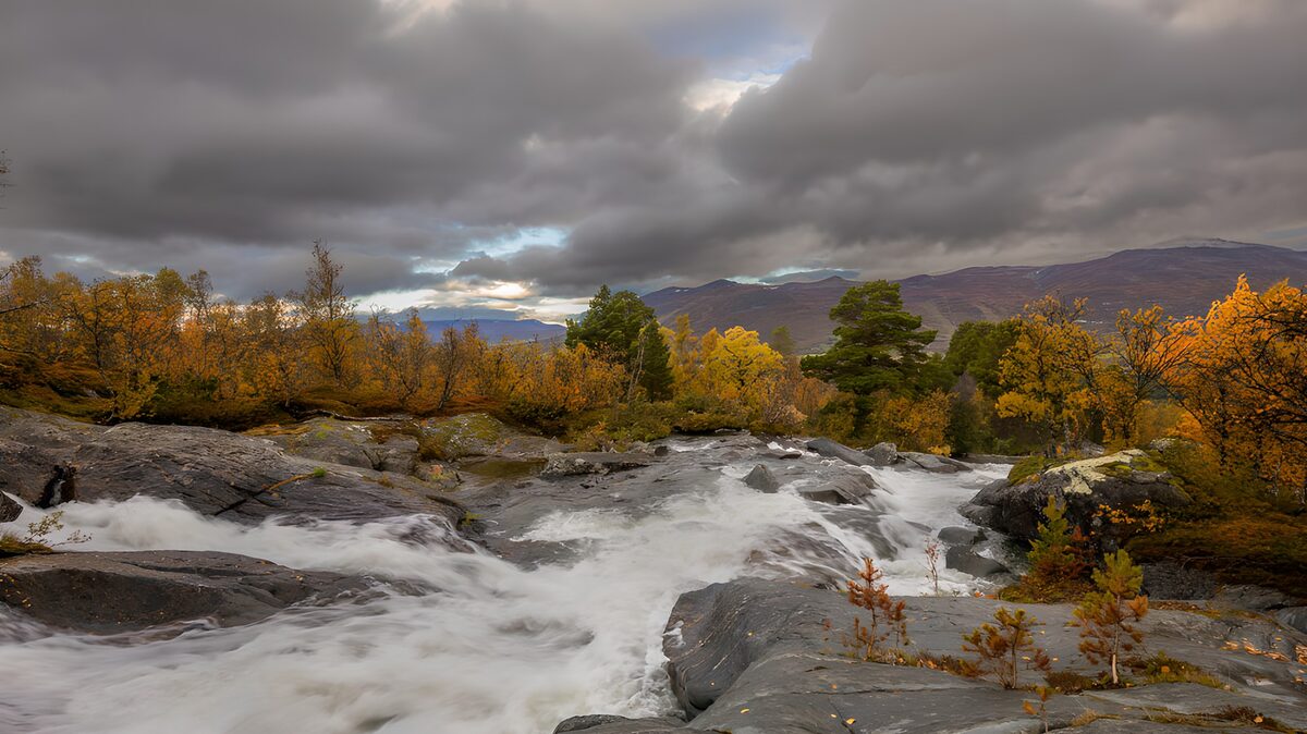OCUK10580: Autumn Rapids Under Cloudy Skies