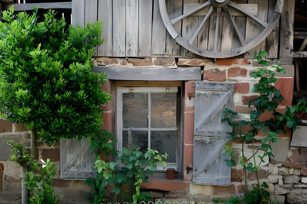 Old French farm with old wheel and shutters etc. version 1