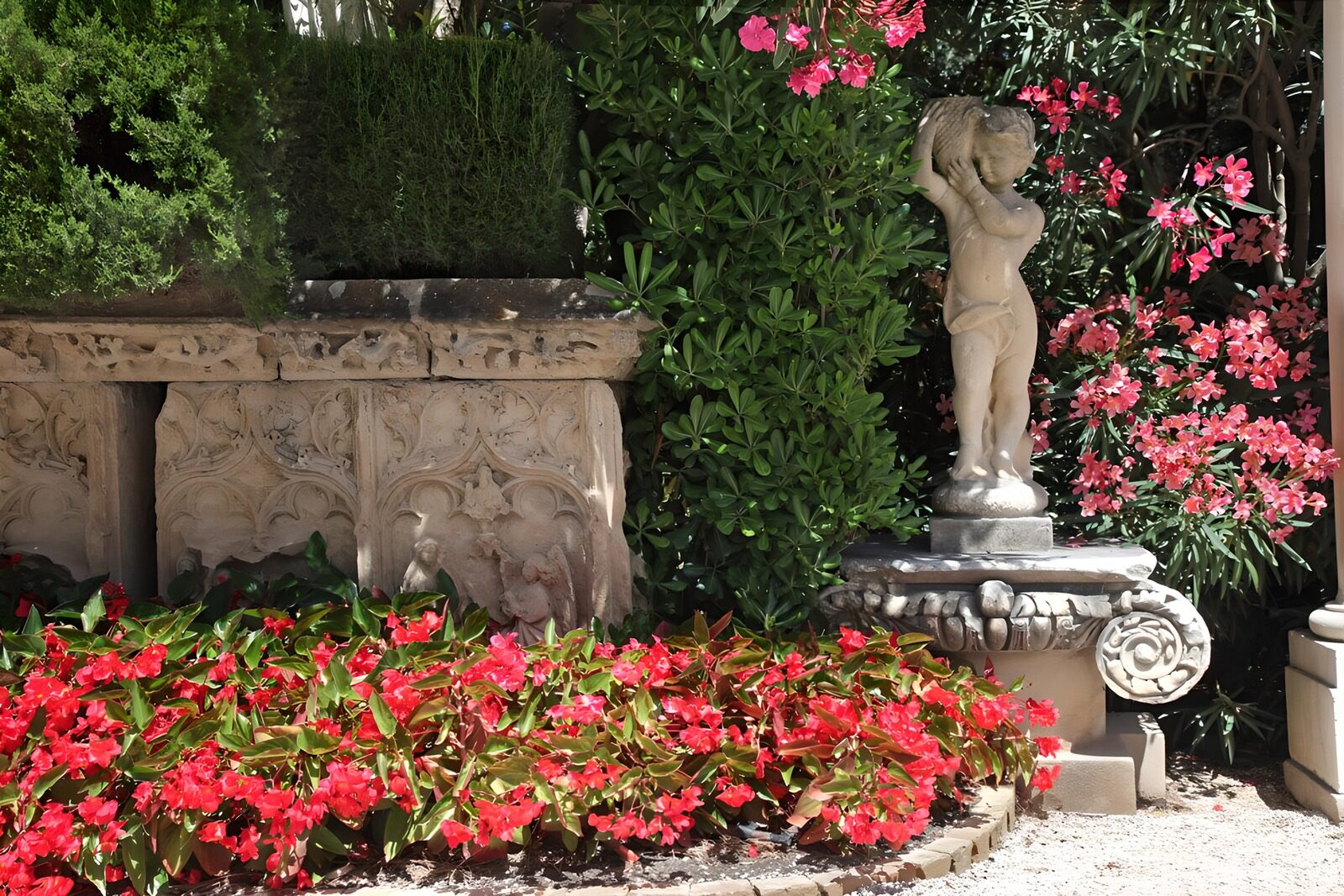 OCUK52258: Serene Garden with Statue and Flowers