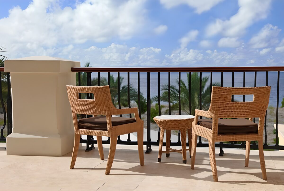 OCUK66903: Small table with 2 cane chairs