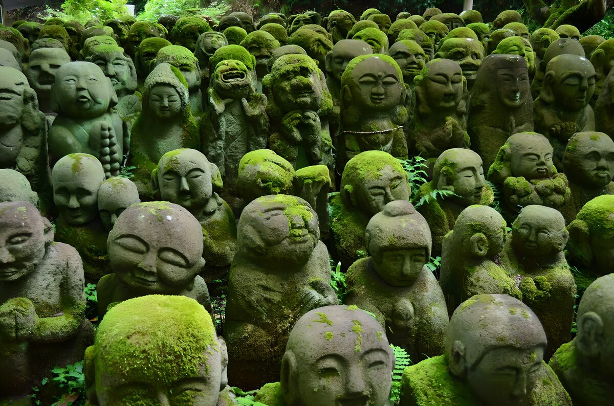 OCUK94562: Serene Stone Guardians in Nature's Embrace