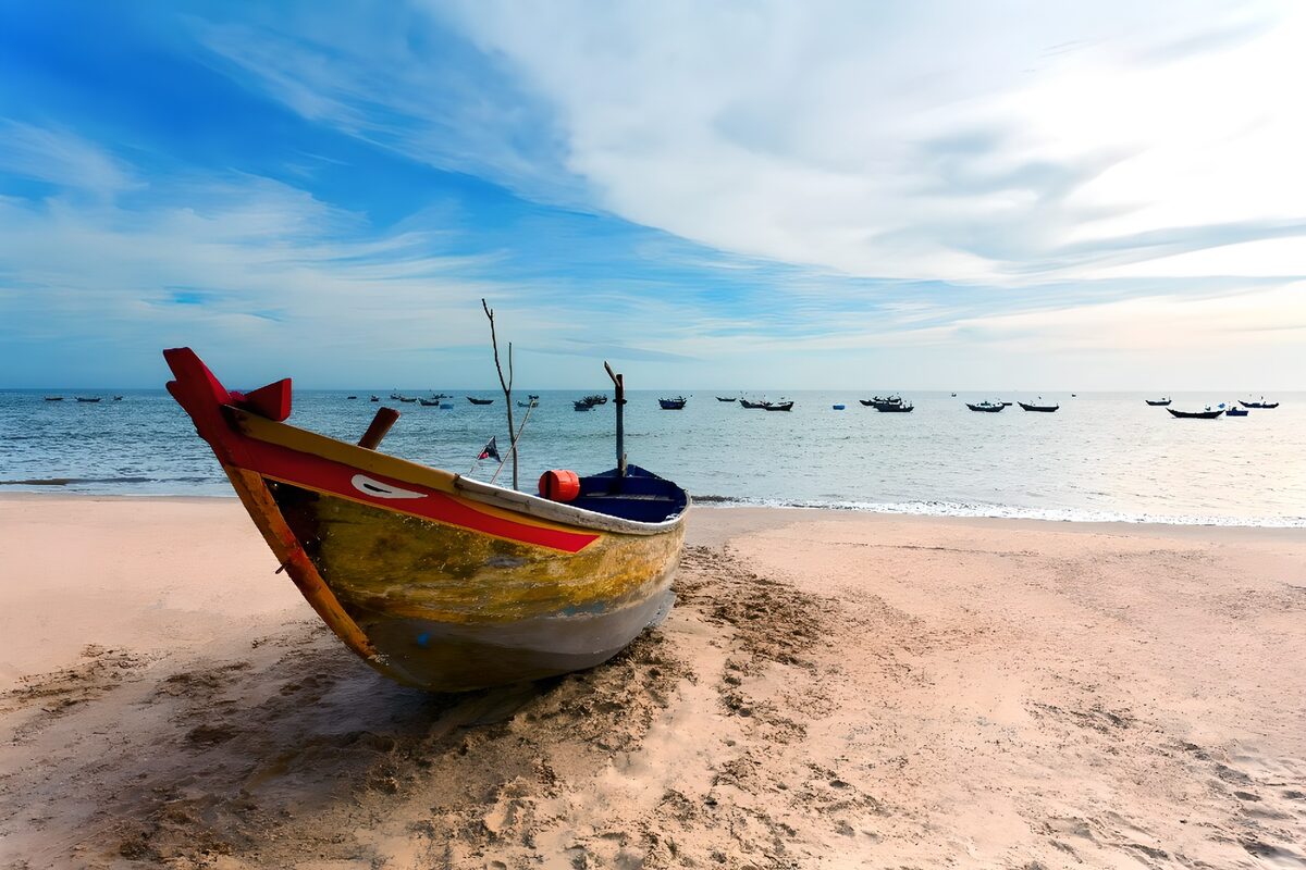 Tranquil Beach Scene with Fishing Boats