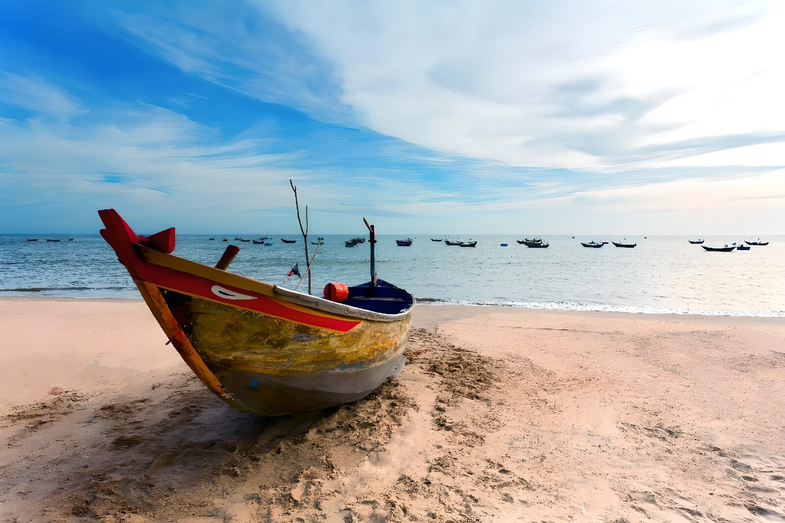 OCUK95381: Tranquil Beach Scene with Fishing Boats