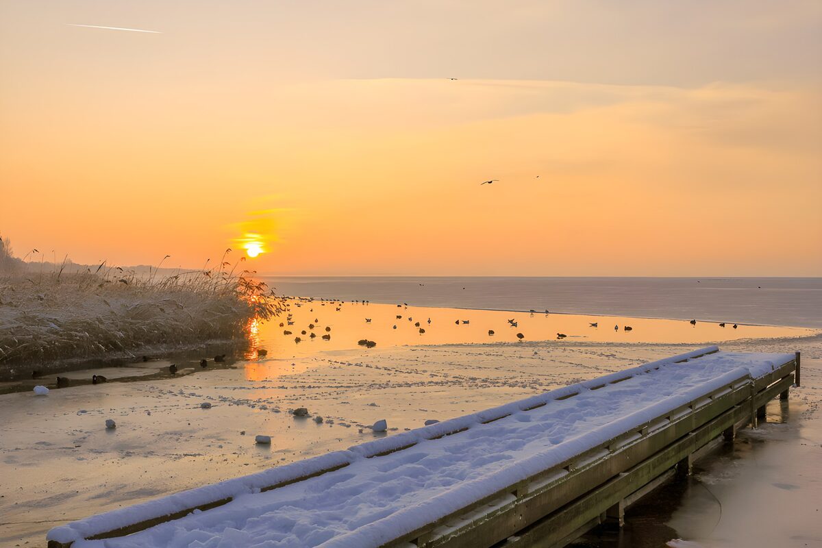 Winter Sunset Over a Frozen Lake