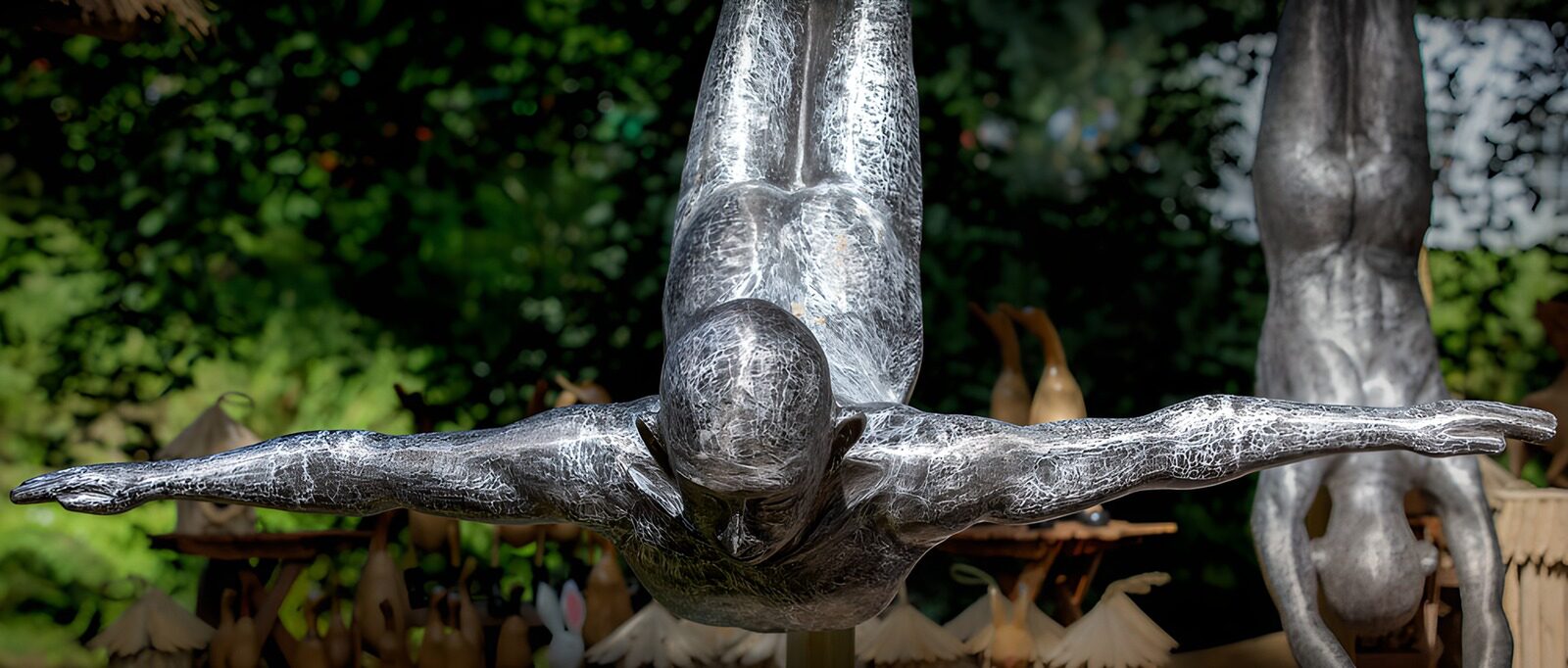 OCUK84380: Silver Swimmers in Mid-Air