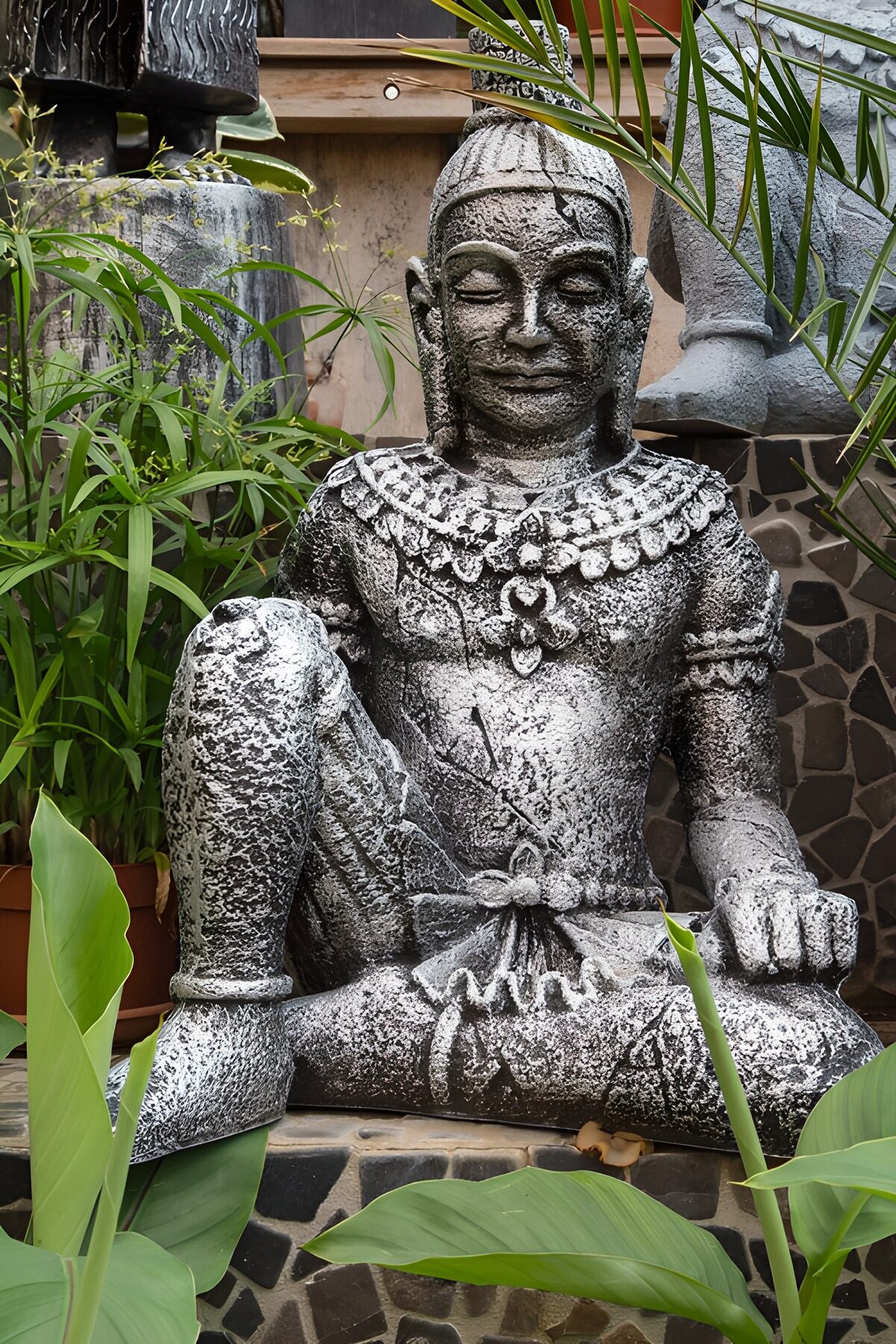 OCUK97908: Serene Stone Figure in Nature