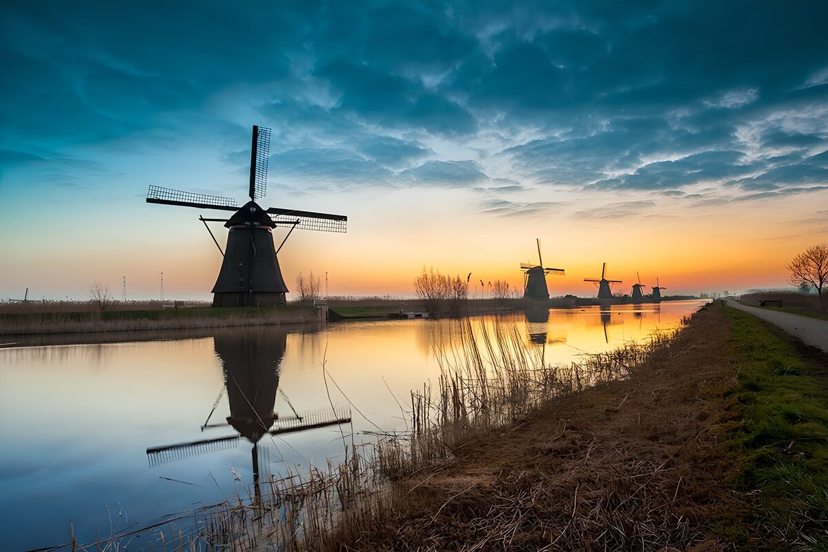 OCUK25643: Serene Dutch Windmills at Dusk
