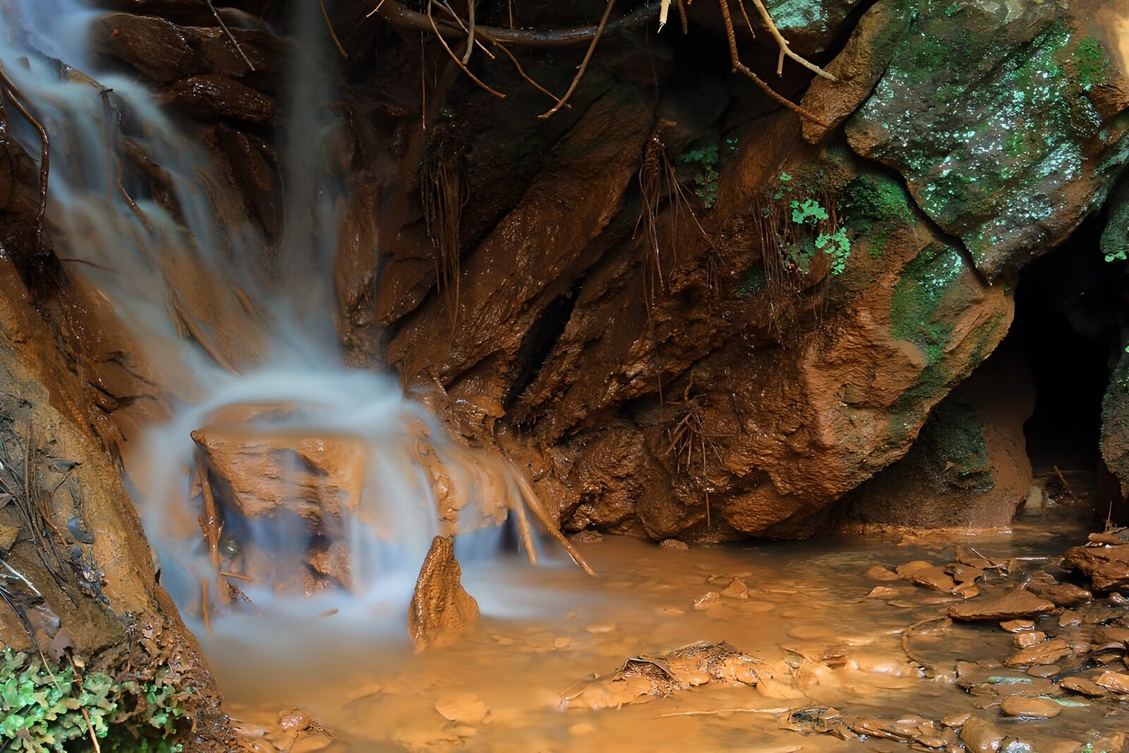 OCUK53728: Serene Waterfall Flowing Through Rocks